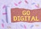 Text sign showing Go Digital. Conceptual photo Working over the internet Going to world of Opportunities Paper clip and