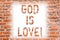 Text sign showing God Is Love. Conceptual photo Believing in Jesus having faith religious thoughts Christianity Brick