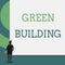 Text sign showing Green Building. Conceptual photo A structure that is environmentally responsible Sustainable Back view