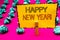 Text sign showing Happy New Year Motivational Call. Conceptual photo Greeting Celebrating Holiday Fresh Start Clothespin hold hold
