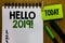 Text sign showing Hello 2019. Conceptual photo expression or gesture of greeting answering the telephone Notebook clothespin holdi