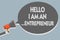 Text sign showing Hello I Am An ...Entrepreneur. Conceptual photo person who sets up a business or startups Man holding