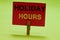 Text sign showing Holiday Hours. Conceptual photo Schedule 24 or 7 Half Day Today Last Minute Late Closing Clothespin