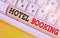 Text sign showing Hotel Booking. Conceptual photo Online Reservations Presidential Suite De Luxe Hospitality White pc keyboard