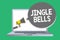 Text sign showing Jingle Bells. Conceptual photo Most famous traditional Christmas song all over the world Man holding megaphone l