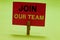 Text sign showing Join Our Team. Conceptual photo Allied Associate Work with us New Employee Hired Enlist Clothespin holding red p