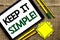 Text sign showing Keep It Simple Motivational Call. Conceptual photo Simplify Things Easy Clear Concise Ideas written on Tablet on