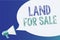Text sign showing Land For Sale. Conceptual photo Real Estate Lot Selling Developers Realtors Investment Megaphone