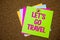 Text sign showing Let \'S Go Travel. Conceptual photo Going away Travelling Asking someone to go outside Trip Postcards various col