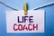 Text sign showing Life Coach. Conceptual photo Mentoring Guiding Career Guidance Encourage Trainer Mentor written on White Note Pa