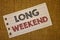 Text sign showing Long Weekend. Conceptual photos Short vacation Holiday season Relaxing Recreation timeNotebook page ideas messag