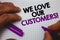 Text sign showing We Love Our Customers Call. Conceptual photo Client deserves good service satisfaction respect Man hold holding
