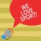 Text sign showing We Love Sport. Conceptual photo To like a lot practicing sports athletic activities work out Megaphone with