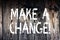 Text sign showing Make A Change. Conceptual photo New Goals Opportunities Different Approach Wooden background vintage