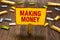 Text sign showing Making Money. Conceptual photo Giving the opportunity to make a profit Earn financial support Clothespin holding