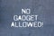 Text sign showing No Gadget Allowed. Conceptual photo do not enter small mechanical or electronic device or tool Brick
