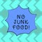 Text sign showing No Junk Food. Conceptual photo Stop eating unhealthy things go on a diet give up burgers fries Blank Color