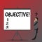 Text sign showing Objective. Conceptual photo Goal planned to be achieved Desired target Company mission Businessman