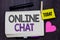 Text sign showing Online Chat. Conceptual photo talking with friend or someone through internet and PC phone Open notebook clothes