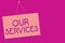 Text sign showing Our Services. Conceptual photo The occupation or function of serving Intangible products Pink board wall message