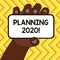 Text sign showing Planning 2020. Conceptual photo process of making plans for something next year Closeup of Smartphone