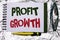 Text sign showing Profit Growth. Conceptual photo Financial Success Increased Revenues Evolution Development written on Notebook B