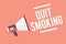 Text sign showing Quit Smoking. Conceptual photo Discontinuing or stopping the use of tobacco addiction Megaphone loudspeaker pink