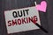 Text sign showing Quit Smoking. Conceptual photo Discontinuing or stopping the use of tobacco addiction White page red borders mar