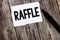 Text sign showing Raffle. Conceptual photo means of raising money by selling numbered tickets offer as prize