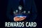 Text sign showing Rewards Card. Conceptual photo Help earn cash points miles from everyday purchase Incentives Male