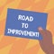 Text sign showing Road To Improvement. Conceptual photo way that thing makes something better or yourself Drawn Hu