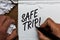 Text sign showing Safe Trip. Conceptual photo wishing someone to reach his destination in good health Man holding marker notebook