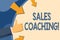 Text sign showing Sales Coaching. Conceptual photo analysisage their team by analyzing metrics and KPIs of selling Hand