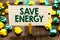 Text sign showing Save Energy. Conceptual photo decreasing the amount of power used achieving a similar outcome Clothespin holding