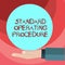Text sign showing Standard Operating Procedure. Conceptual photo Detailed directions on how to perform a routine Hu