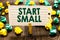 Text sign showing Start Small. Conceptual photo Small medium enterprises start up Business entrepreneurship Clothespin holding not