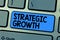 Text sign showing Strategic Growth. Conceptual photo create plan or schedule to increase stocks or improvement