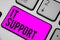 Text sign showing It Support. Conceptual photo Lending help about information technologies and relative issues Keyboard purple key