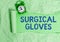 Text sign showing Surgical Gloves. Conceptual photo to protect from the exposure to infectious materials Rolled ripped