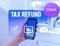 Text sign showing Tax Refund. Conceptual photo refund on tax when the tax liability is less than the tax paid woman