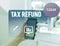 Text sign showing Tax Refund. Conceptual photo refund on tax when the tax liability is less than the tax paid woman