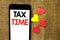 Text sign showing Tax Time. Conceptual photo Taxation Deadline Finance Pay Accounting Payment Income Revenue written on Cardboard