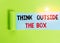 Text sign showing Think Outside The Box. Conceptual photo Be unique different ideas bring brainstorming Cardboard which