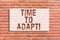 Text sign showing Time To Adapt. Conceptual photo Moment to adjust oneself to changes Embrace innovation Brick Wall art