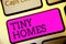 Text sign showing Tiny Homes. Conceptual photo houses contain one room only or two and small entrance Cheap Keyboard purple key In