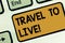 Text sign showing Travel To Live. Conceptual photo Get knowledge and exciting adventures by going on trips Keyboard key