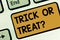 Text sign showing Trick Or Treat. Conceptual photo Halloween tradition consisting in asking for sweets Keyboard key