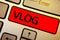 Text sign showing Vlog. Conceptual photo Entertaining multimedia self broadcasting news reporting stories Keyboard brown keys yell