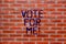 Text sign showing Vote For Me. Conceptual photo Campaigning for a government position in the upcoming election Brick