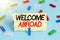 Text sign showing Welcome Abroad. Conceptual photo something that you say when someone gets on ship Colored clothespin papers